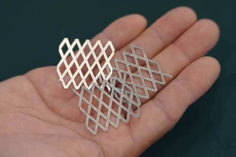 A stainless steel mesh developed for seawater hydrogen production, in someone's palm