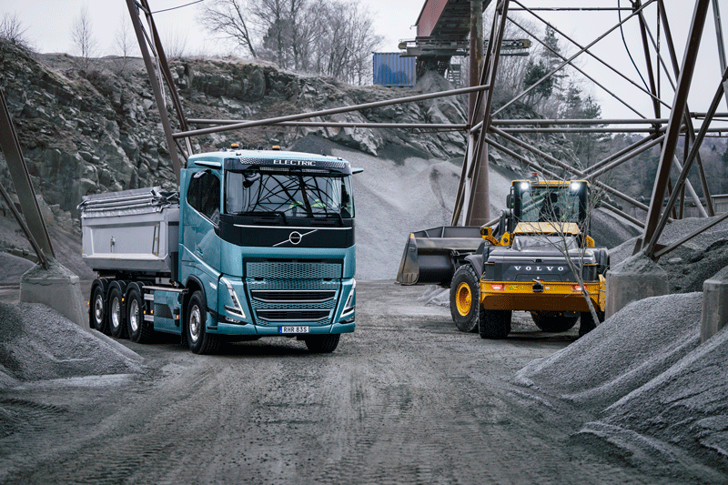 A truck and a construction vehicle
