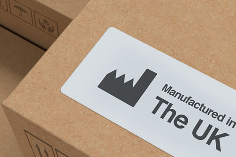 Cardboard carton boxes with manufactured in United Kingdom label -