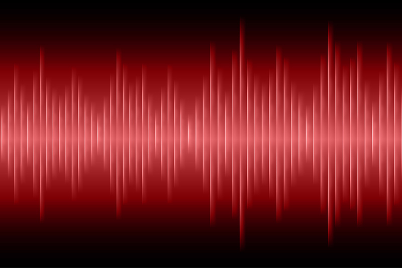 Sound waves oscillating glow red light