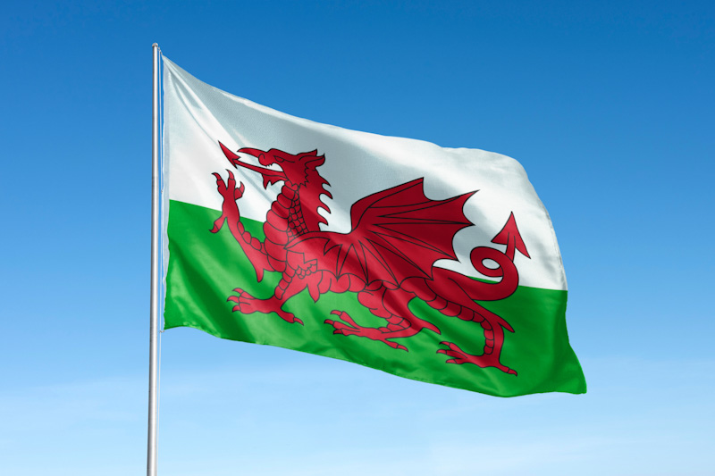 The Welsh flag features a red dragon on a green and white background.