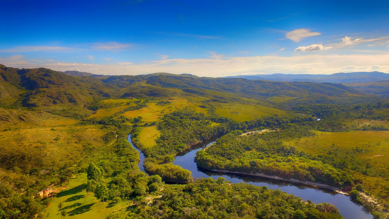 River runs through lush, green countryside