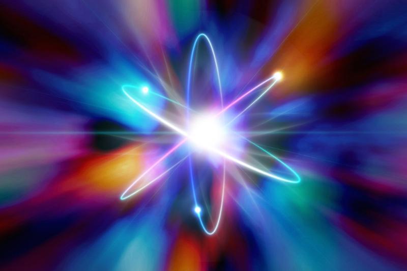 A graphic representation of a symbol of a nucleus surrounded electrons