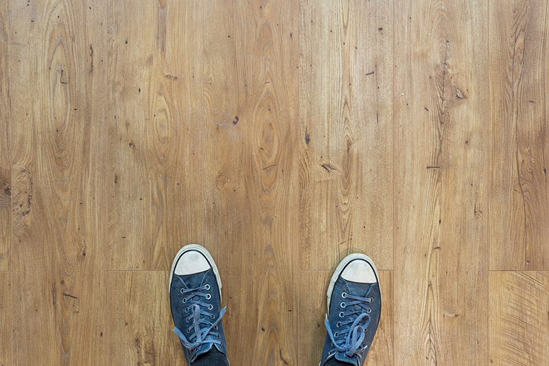 Rubber tipped shoes on wood floor