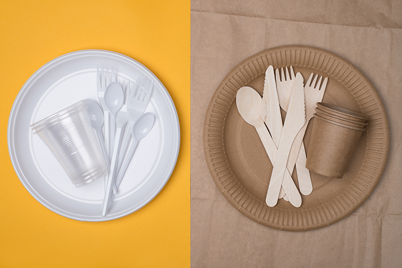 Stock image of paper and plastic utensils and plates