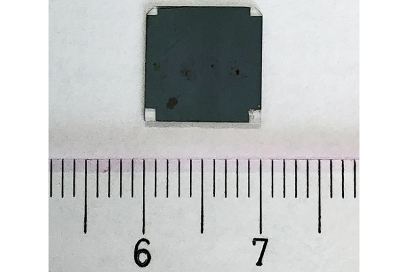 small black square material showing 1cm wide