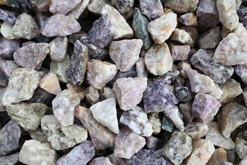 Stock image of commercial-grade lithium ores in shades of grey and purple