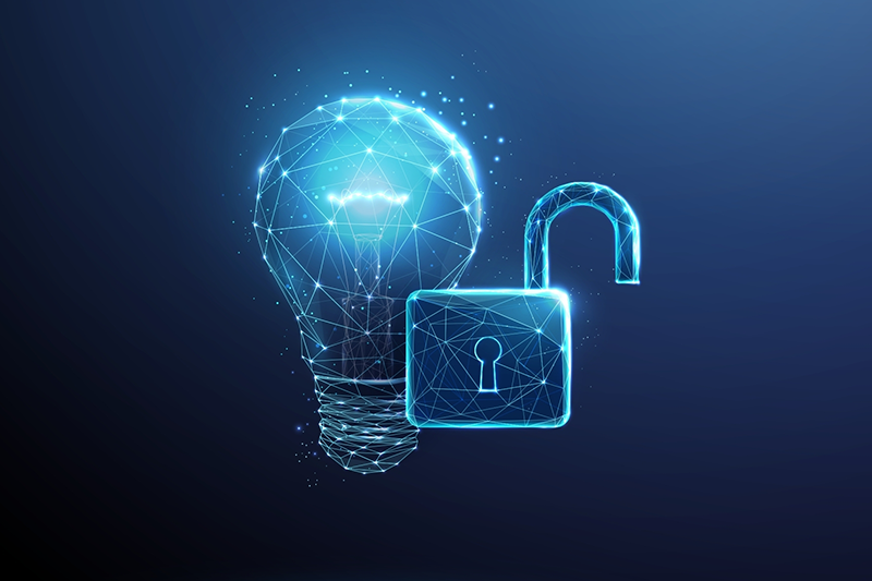 Stock graphic of a lock being unlocked with a lightbulb next to it