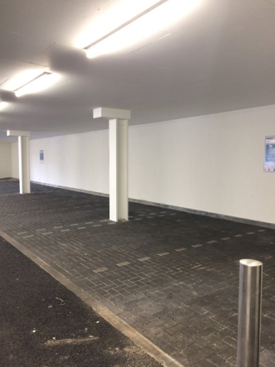 Commercial  car park that uses the wall boards for safety