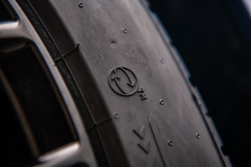 Section of a tyre showing FSC logo and an indicator of bio-based material content