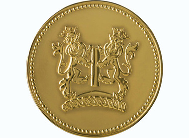 Gold circular medal with two heraldic lions