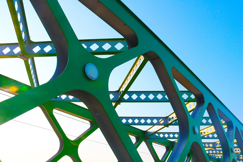 The Old Bridge over the Danube River in Bratislava, Slovakia. Painted green