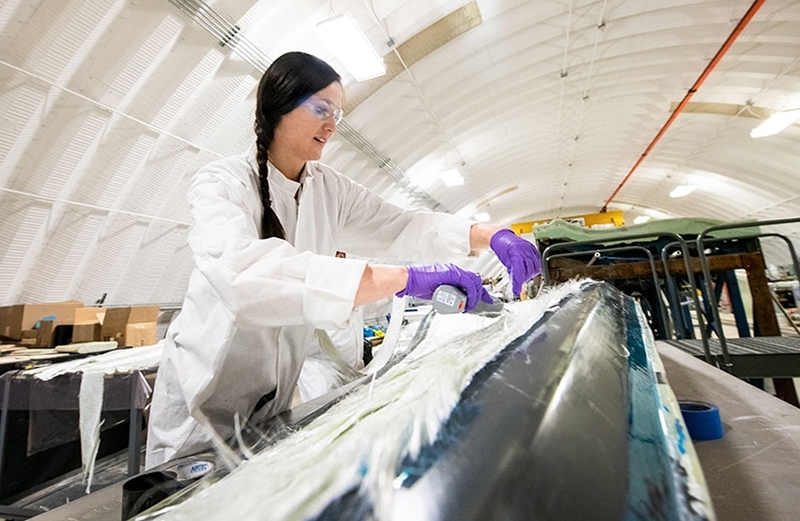 NREL Researcher Robynne Murray works on a thermoplastic composite turbine blade