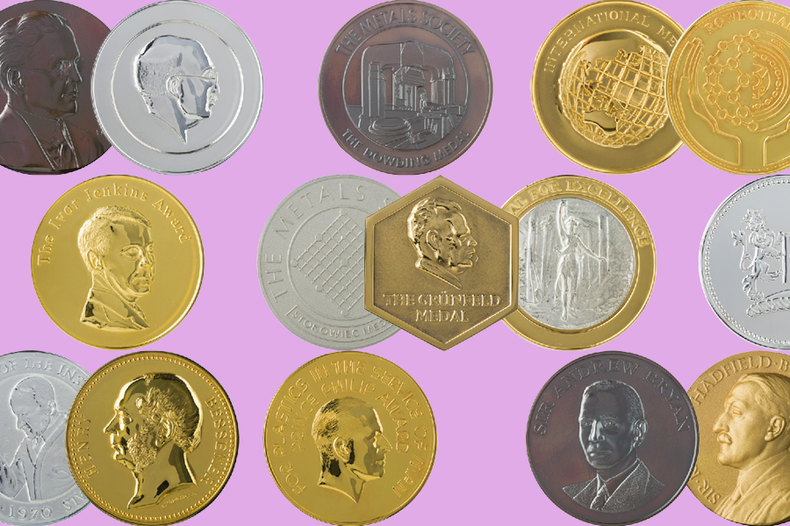 lilac background with overlapping IOM3 medals scattered accross