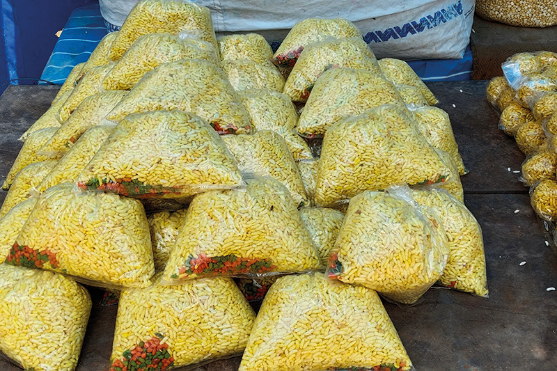 Stock image of snacks bagged up at a food and snack shop in Ariyalur, Tamil Nadu, India
