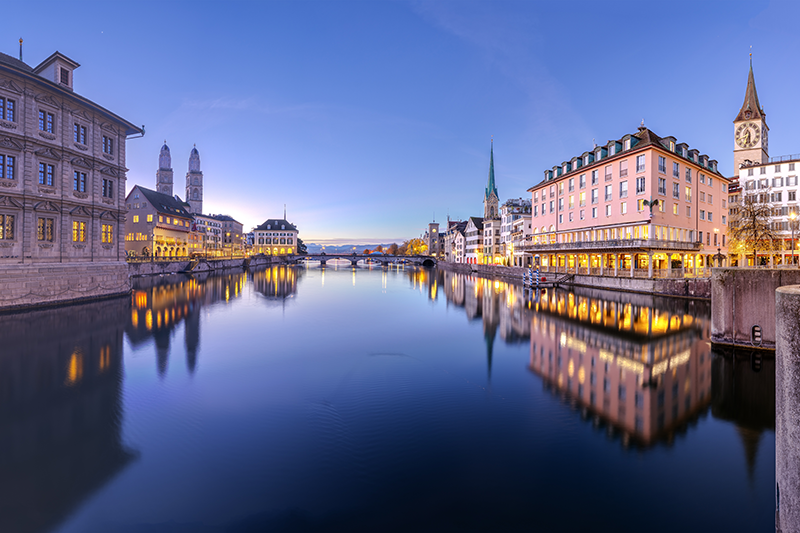 Stock image of buildings on a river in Zurich