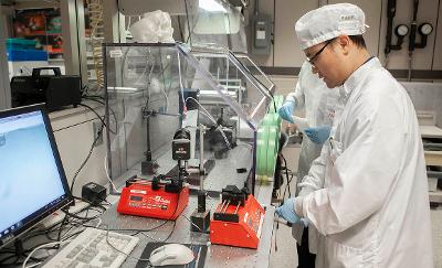 Senior researcher Daewoo Han creating new fibres from coaxial electrospinning in  University of Cincinnati’s Nanoelectronics Laboratory