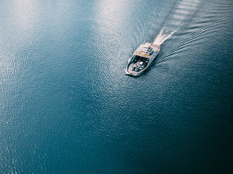 Birds-eye view of car ferry at sea