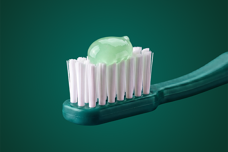 toothpaste on a toothbrush