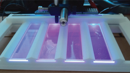Glass emitting UV CMYK.jpg