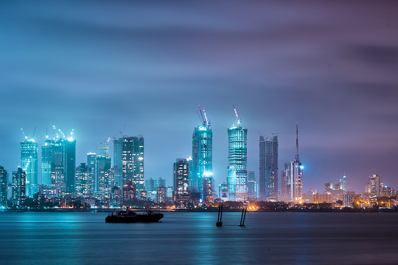 Stock image of the Mumbai city skyline from sea at night