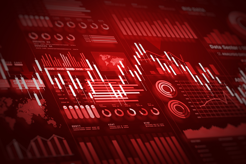 Stock image of financial charts highlighted in red