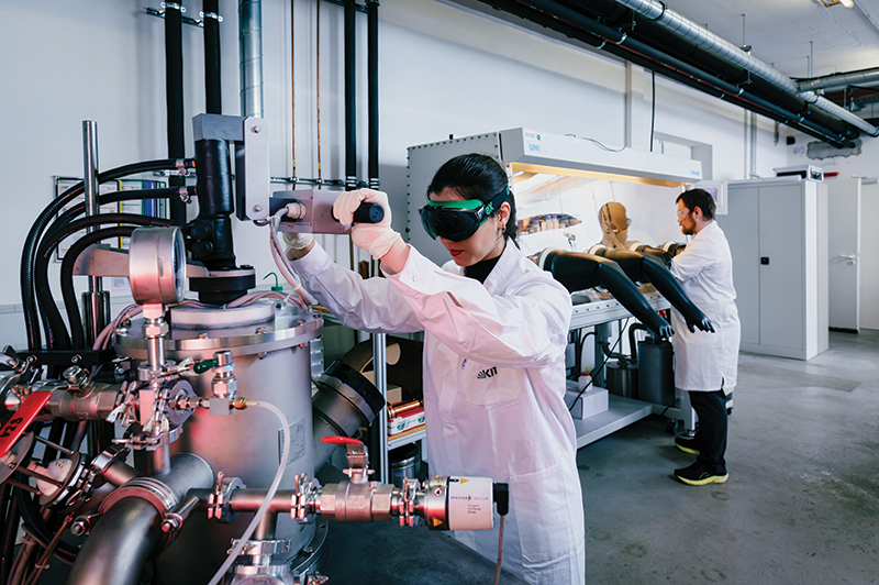 Researchers working in a lab in the Institute for Applied Materials at Karlsruhe Institute of Technology, Germany