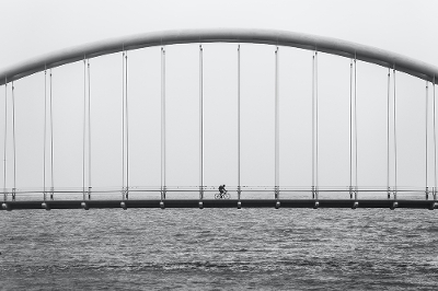 Cyclist on bridge