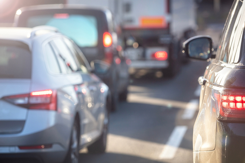 Traffic jam congestion with rows of cars on highway or motorway 