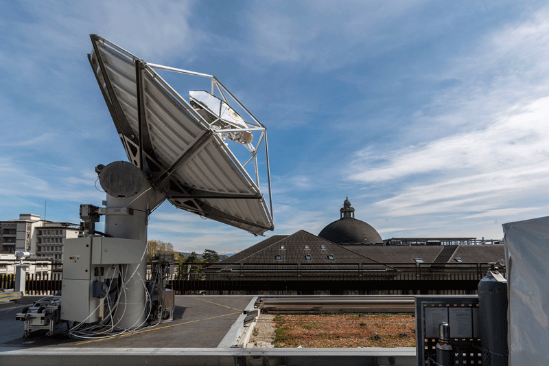 The parabolic reflector bundles the light and directs it to the two reactors in the middle of the plant