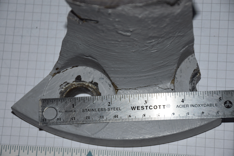 Cracking between bolt holes in a sample cut from a fibreglass reinforced plastic flange