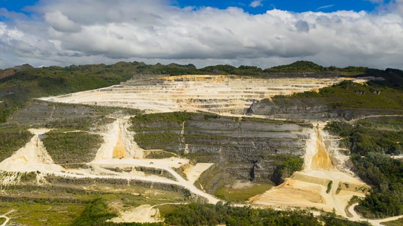 Open pit limestone quarry in the mountains of Bohol Island, Philippines 