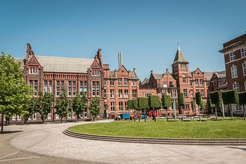 The University of Liverpool main red-brick front on a sunny summers day