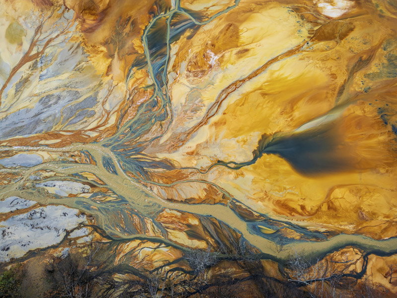 Abstract patterns formed from the toxic waste of the copper and gold mining operations