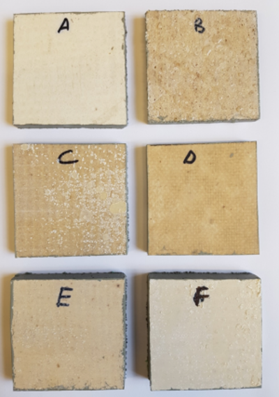 Different board samples following exposure to 30°C and 90% relative humidity. A and D were unaffected, while B, C, E and F displayed crying or deposition of chloride-rich salts