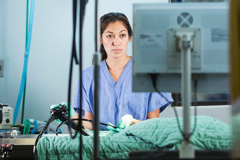 Nurse using endoscope