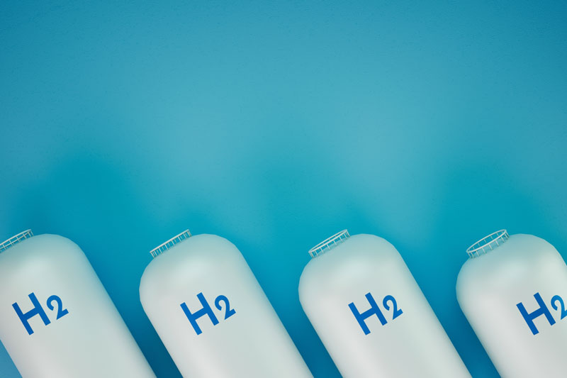 Canisters holding hydrogen with a plain background