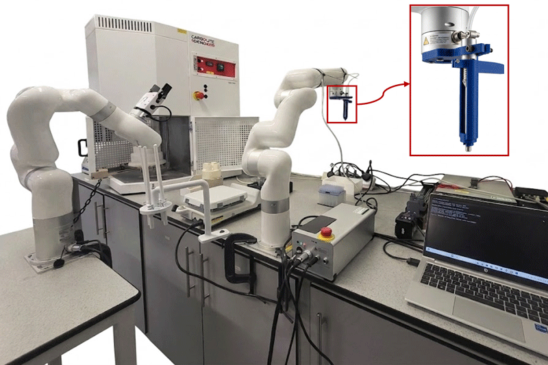 A lab with a robot and a computer