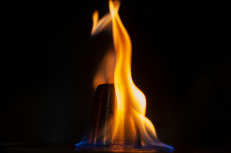 Stock image of a lick of flames against a black background