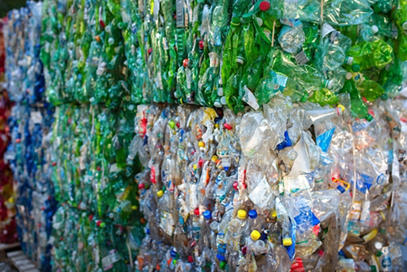 Bales of compressed plastic bottles