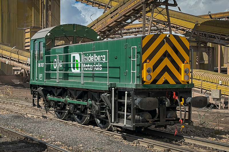 A green-coloured converted electric shunting locomotive pictured in Whatley quarry in Somerset