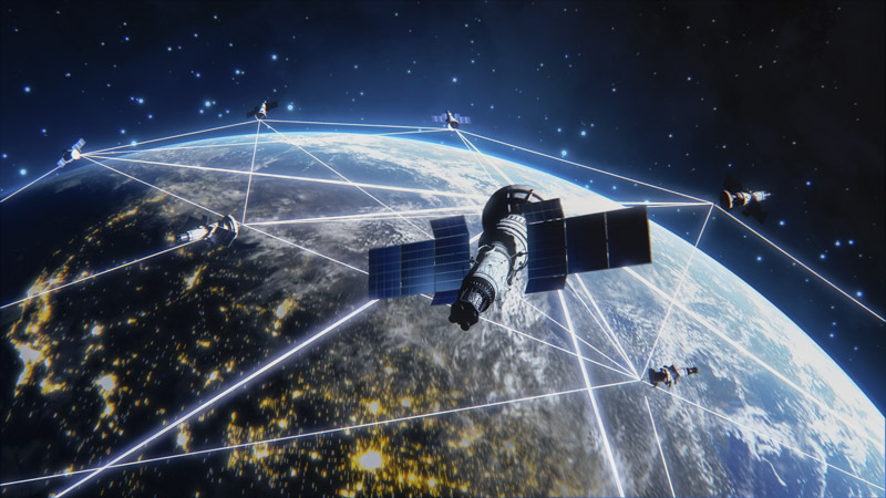 Satellite spreading a visible network across the earth in space