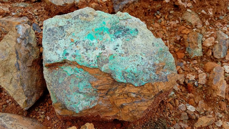 High grade nickel ore in ultramafic peridotite rock pictured. The rock is a pale green colour on the surface.