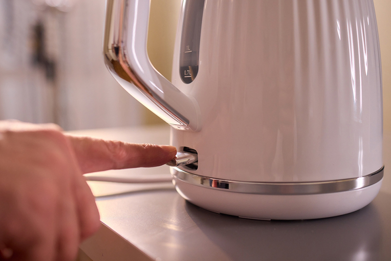 Finger switching on an electric kettle