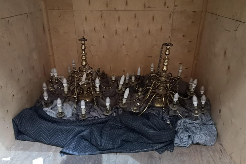 two boxed chandeliers