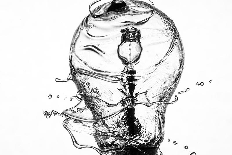 lightbulb being doused with water