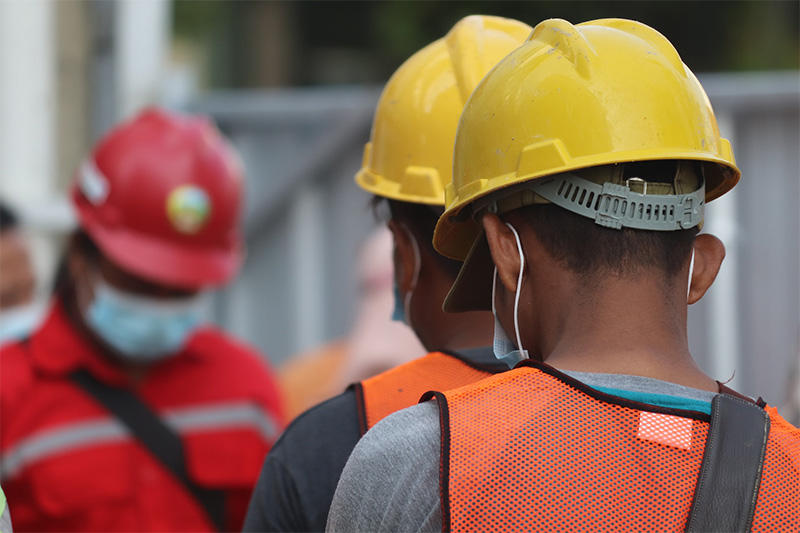 Workers in hard hats